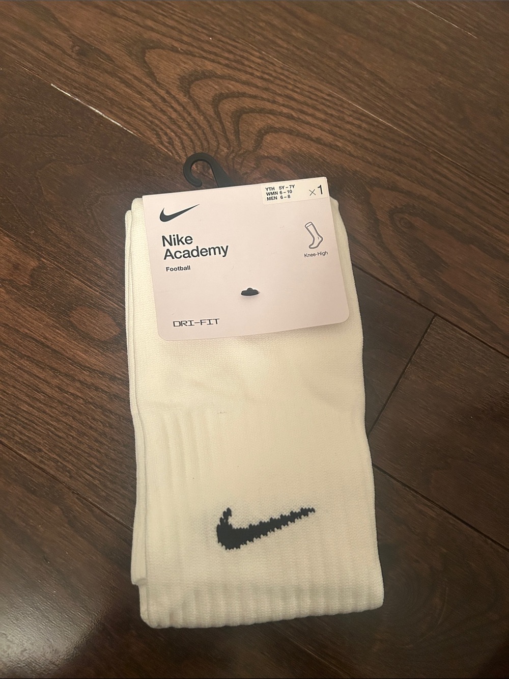 Nike White Knee-High Athletic Socks with Black Swoosh